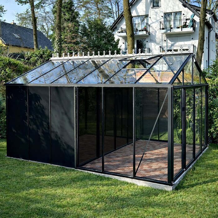 Bloomcabin Premium Classic aluminum greenhouse with integrated storage room, tempered safety glass panels, sliding doors, roof ventilation windows, and elegant garden greenhouse design for year-round growing and organized outdoor storage.