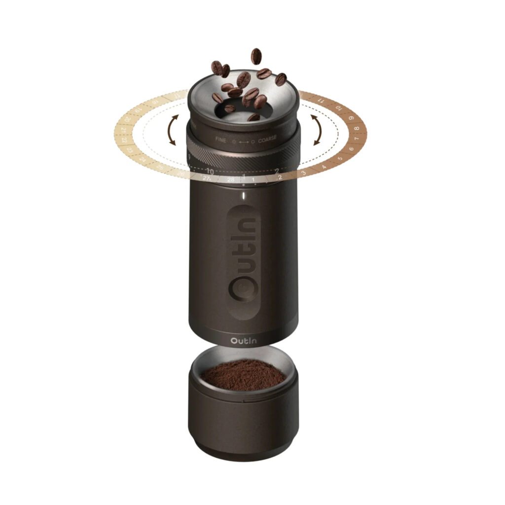 OutIn portable electric coffee grinder showing coffee beans being fed into the grinder and freshly ground coffee powder output